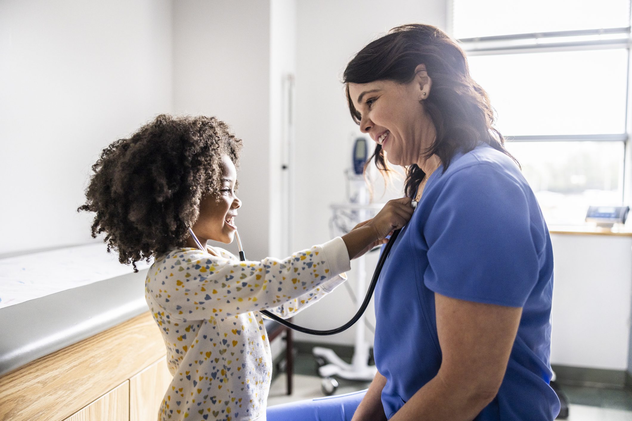 Doctor caring for young patient